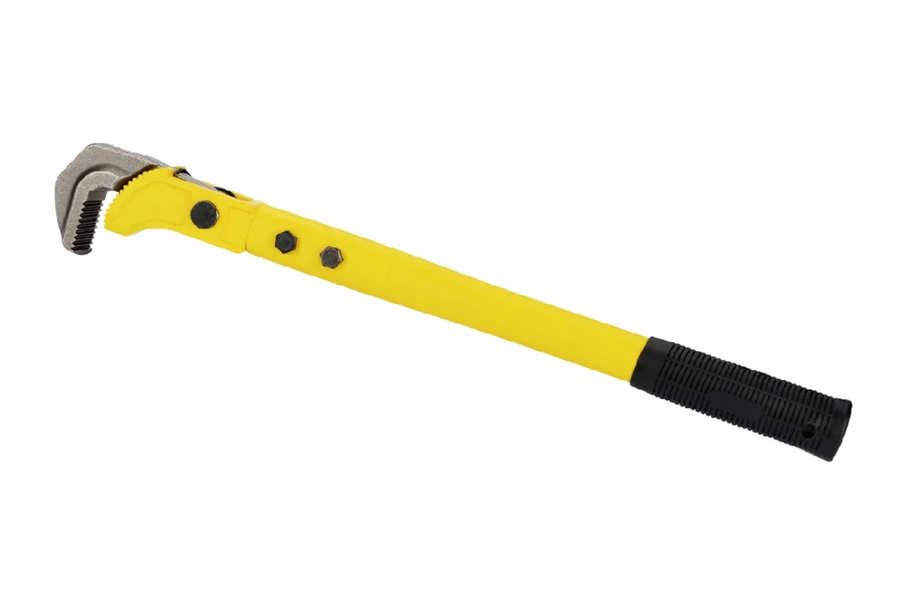 Complete pipe wrench, including its jaws and handle