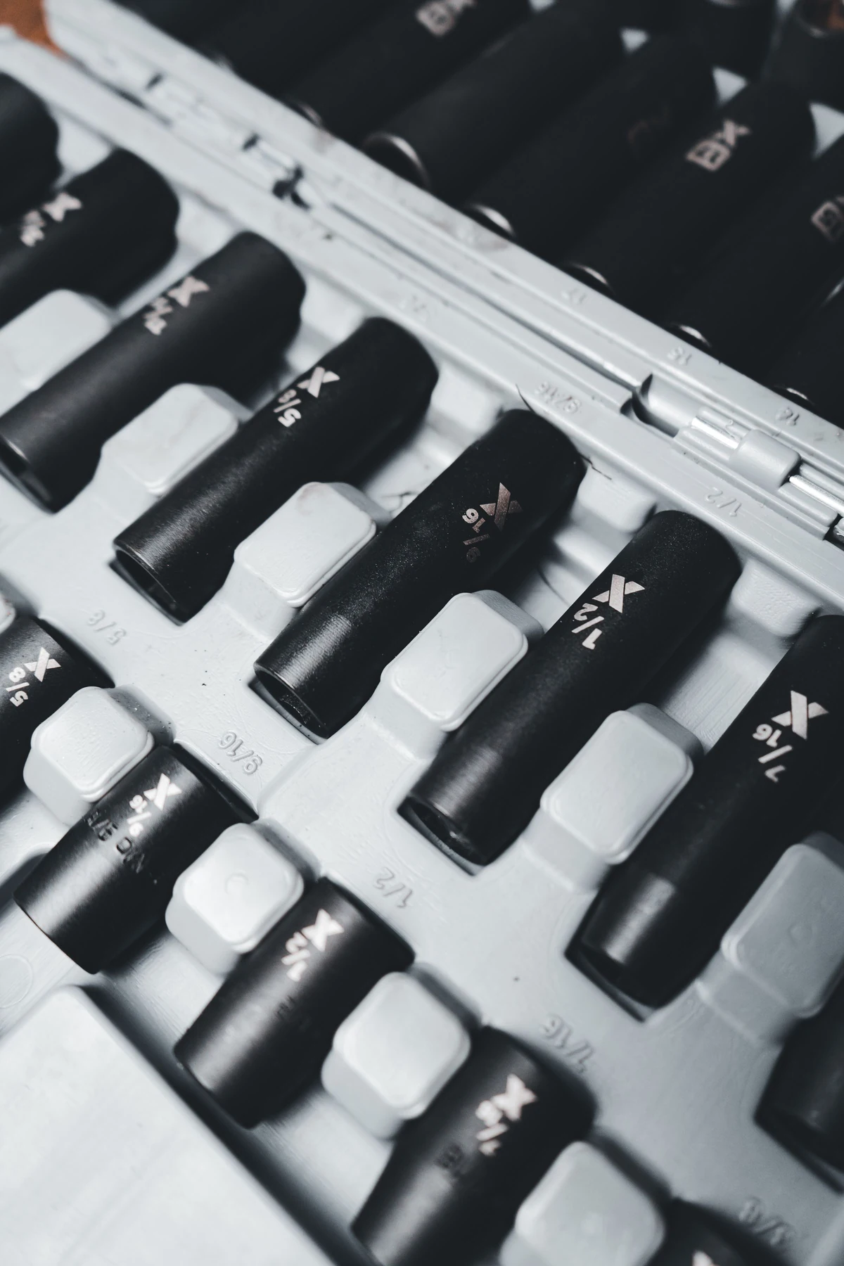 An impact socket assortment organized in a fitted case